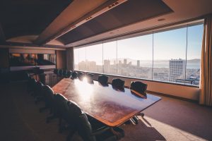 An interior shot of meeting room in a business building with a beautiful view of  downtown SF